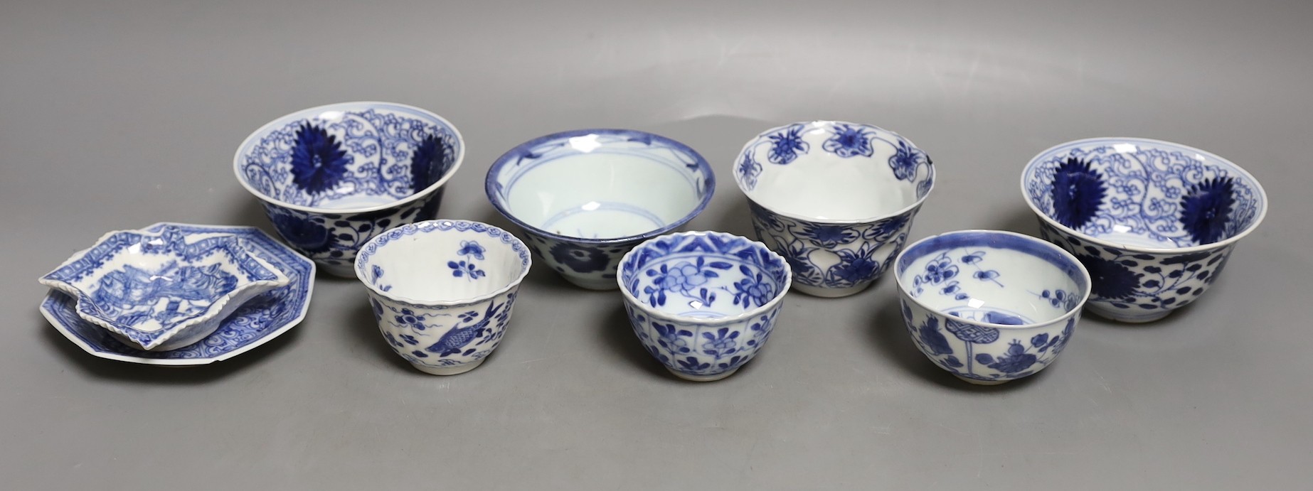 A group of Chinese blue and white tea bowls, 18th century a saucer and a in English porcelain leaf dish